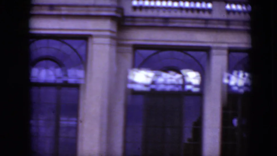 1975 Middletown, Pennsylvania frame showing lower arched windows, a column and facade details on soft 8mm film.