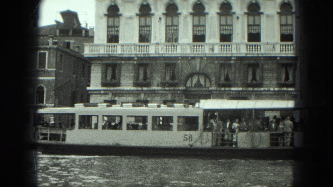 Water bus marked 58 passes along a Venice canal in front of ornate waterfront buildings.