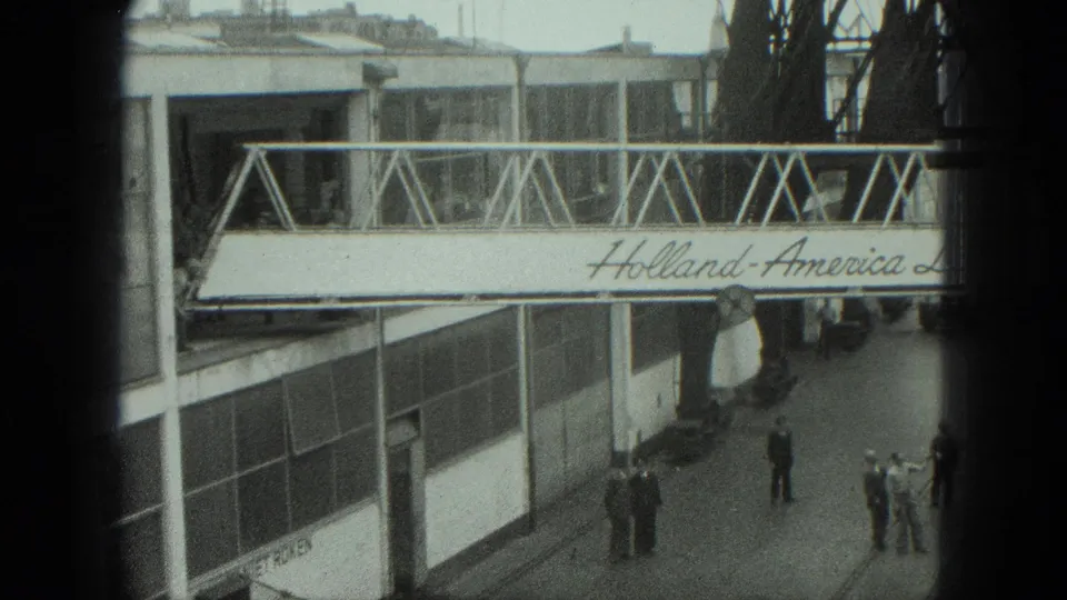 The 1975 Venice port view shows the gangway spanning the frame while people stand below the terminal wall.