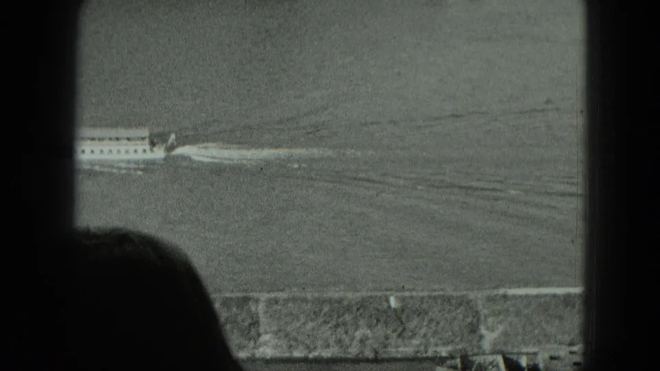 The final 1951 West Germany frame shows the vessel mostly leaving the view, with its wake stretching across calm harbor water.