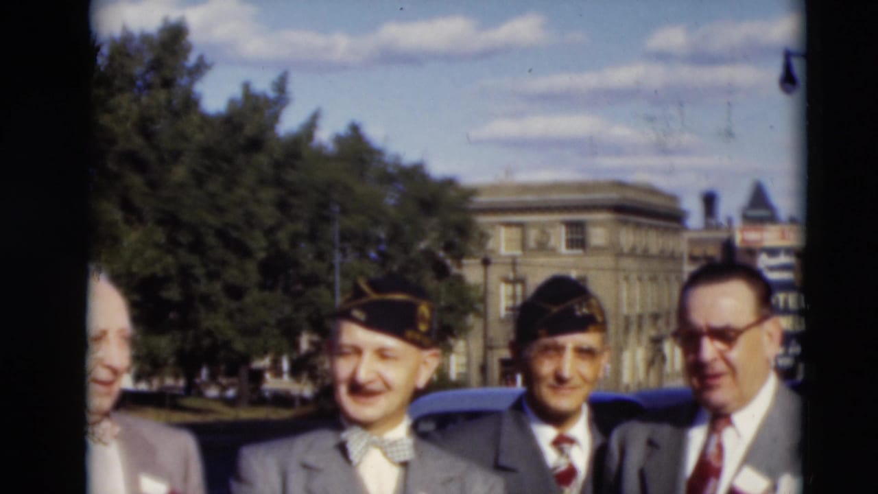 A closer 1951 Paducah street view shows suited men, two caps, partial figures at the edges, a parked car, trees, and a visible hotel sign.