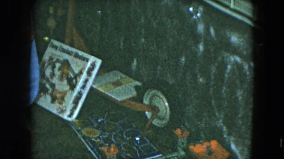 The final frame shows a toy package, wooden pull toy, and scattered pieces on the floor, with the child mostly at the frame edge.