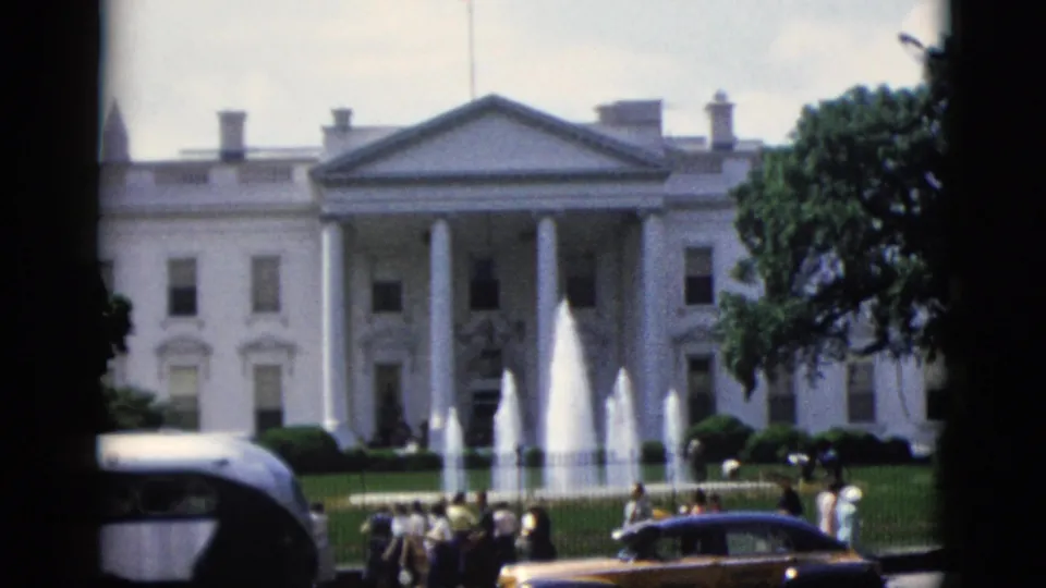 White House North Portico, Washington DC, circa 1952 — slightly wider angle reveals more facade, yellow taxi, dark sedan, and bystanders at fence.
