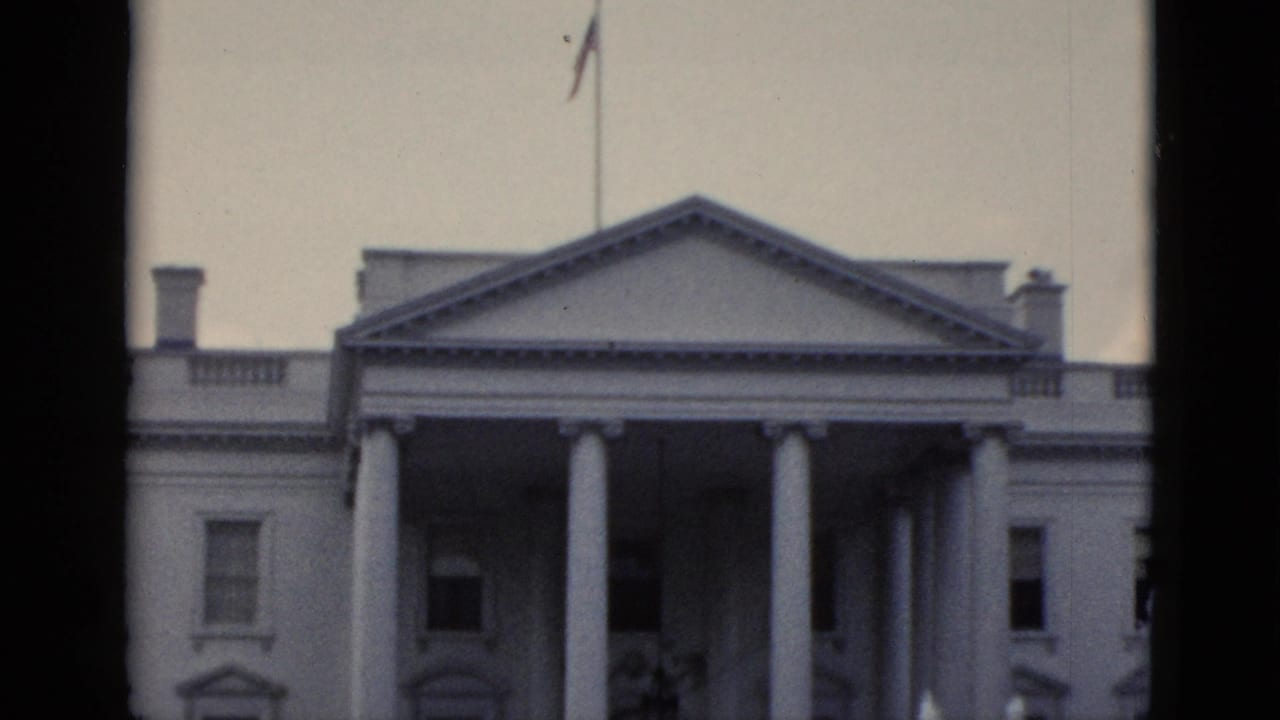 White House North Portico, Washington DC, circa early 1950s — American flag flies from the masthead above the neoclassical facade.