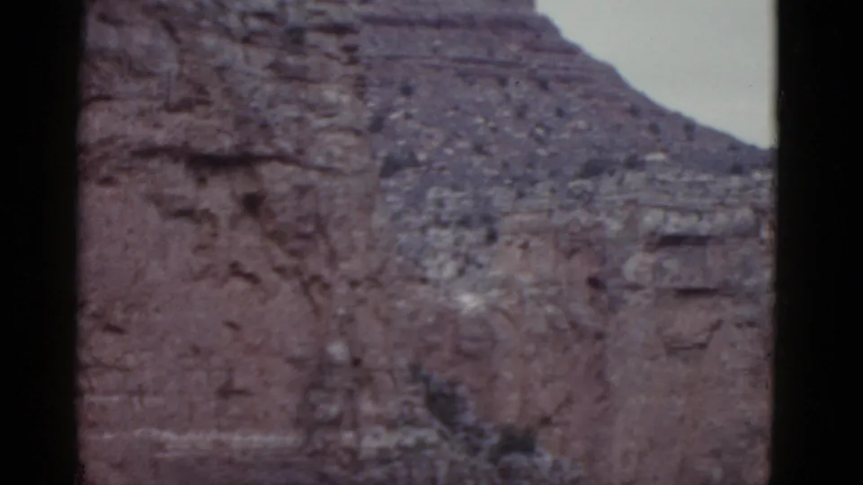 1952 Arizona home-movie view of a steep, textured Grand Canyon rock formation.