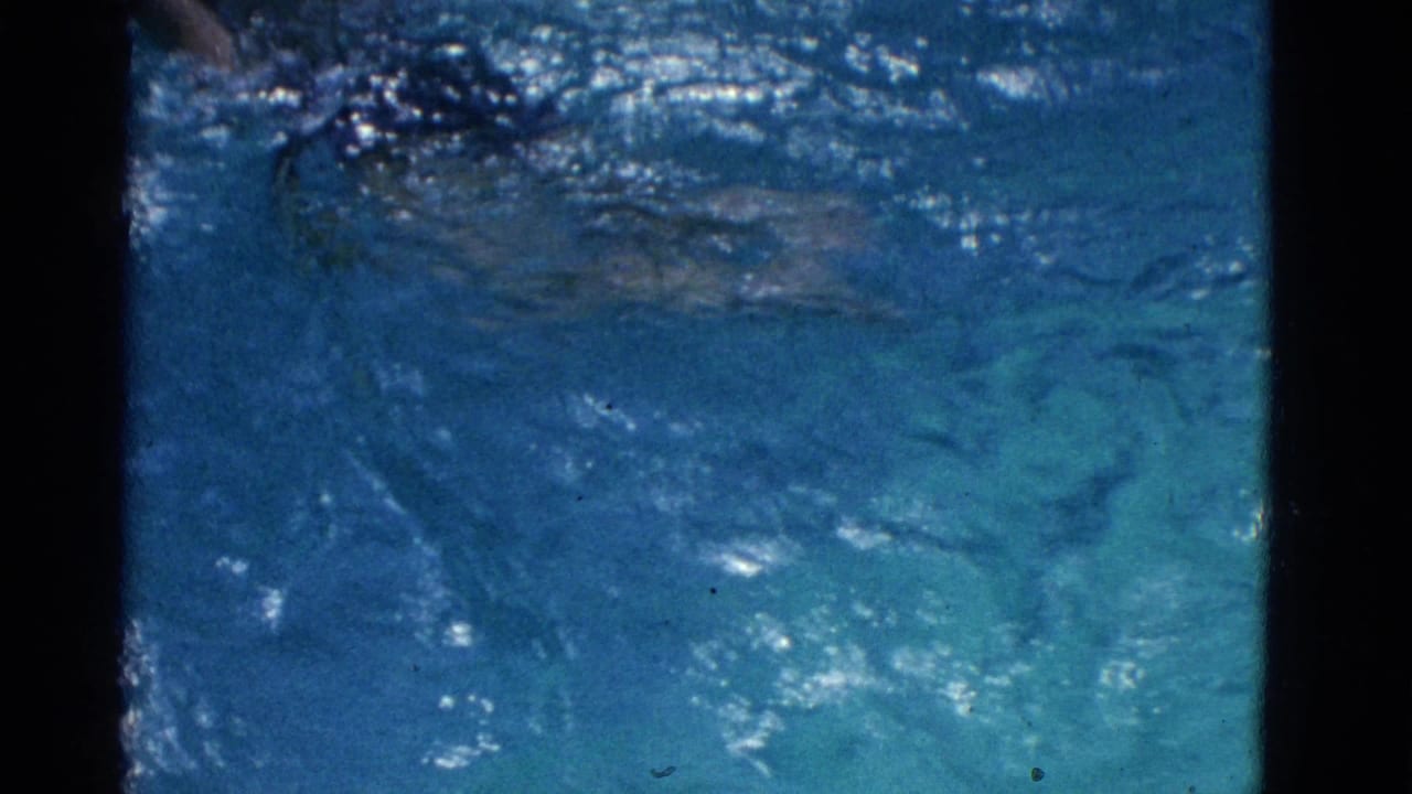 Blue pool water with ripples and dark 8mm frame borders.