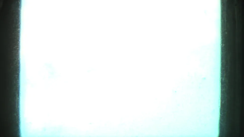 Overexposed 8mm home-movie frame from the pool sequence, with pale blue-green water and dark vertical gate edges.