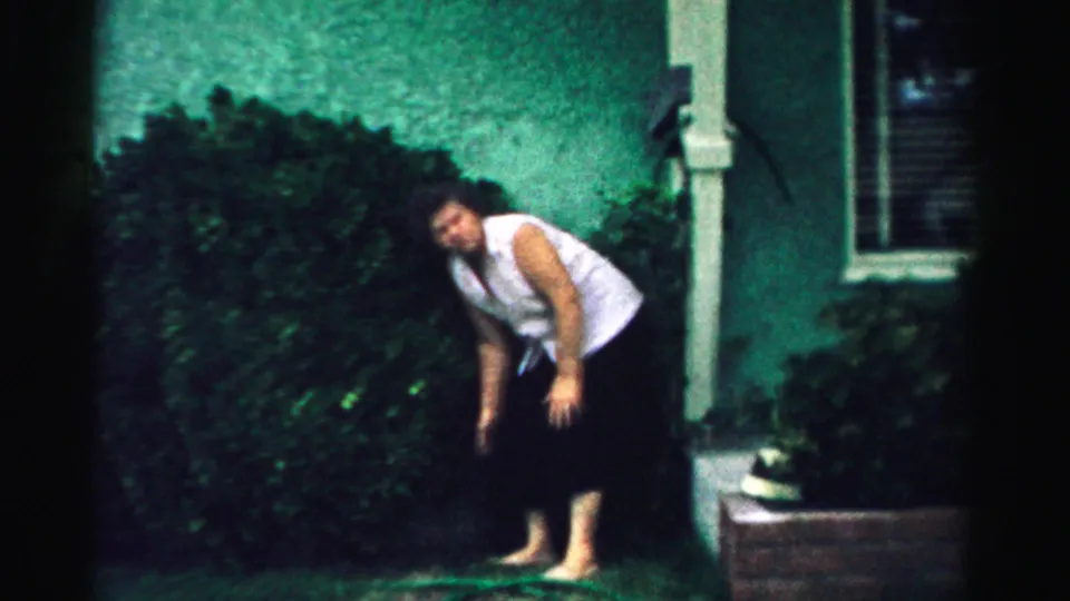 The final frame shows the woman still stretching barefoot near the hedge, planter, and house exterior in the Illinois yard.