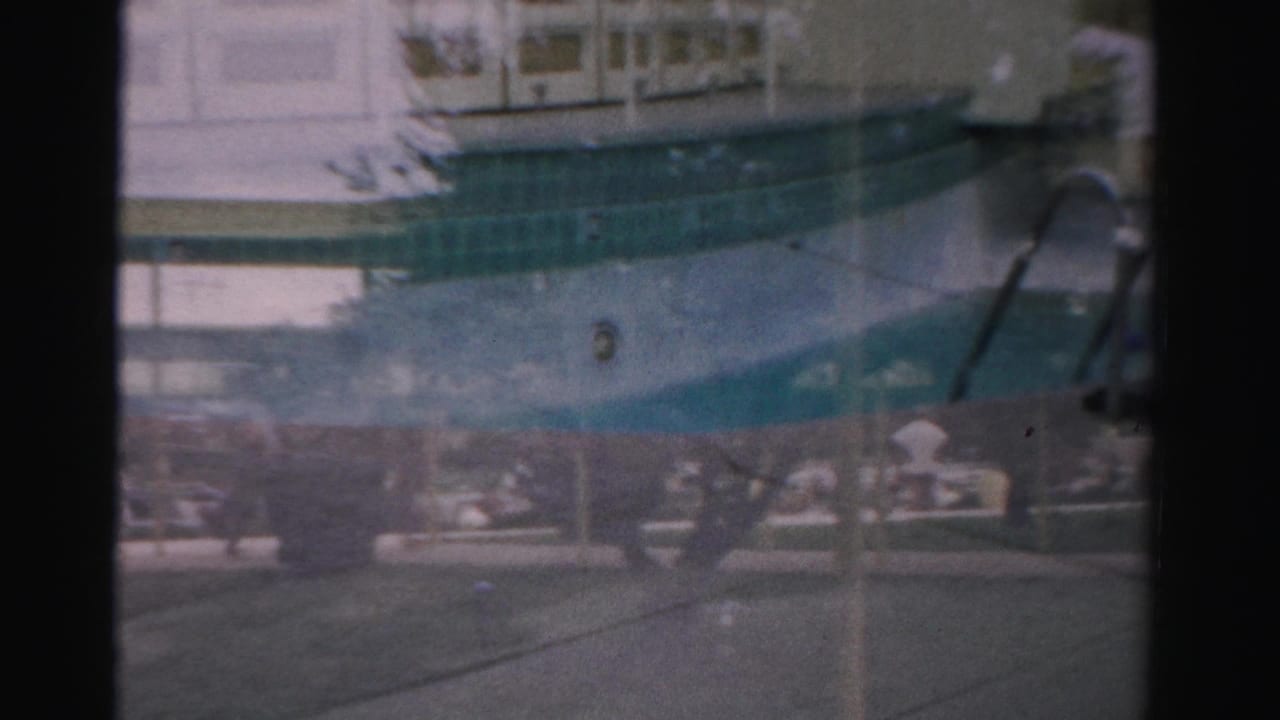 Swimming pool with a pool-closed sign, railings, and lounge chairs in the background.