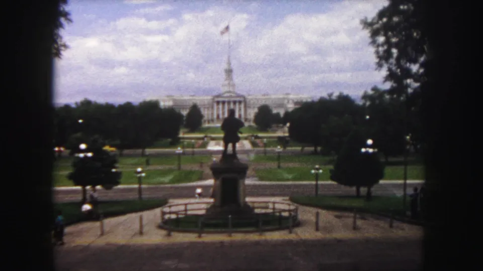 1958 Denver footage shows a wide Civic Center Park view with the capitol in back and a pedestrian near the lower-left walkway.