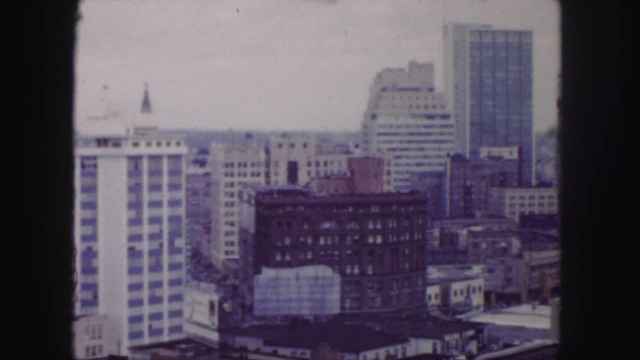Downtown skyline with office towers and older commercial blocks.