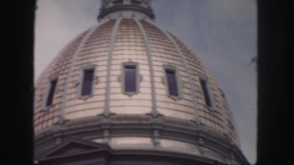 1958 Denver frame with an upward view of the historic building dome, showing tile rows, ribbing, and inset windows.