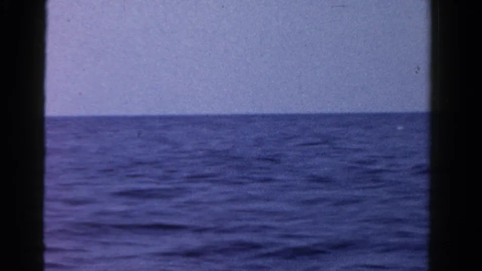 1958 Ontario home-movie view of calm open water and sky, with soft 8mm color and grain.