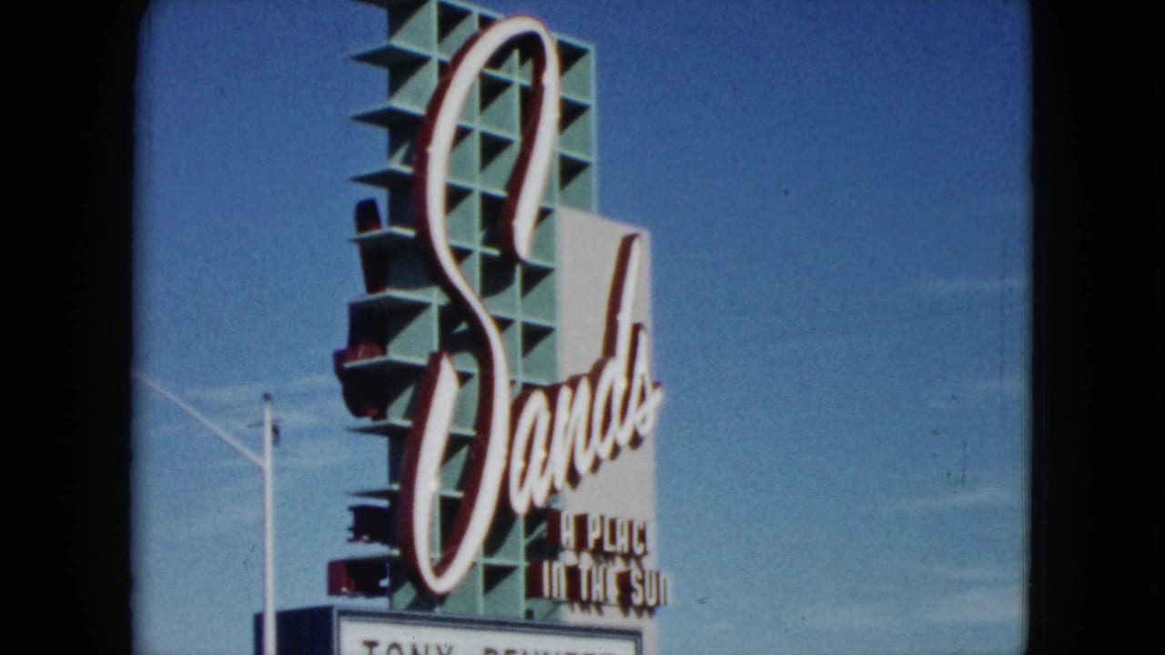 1959 Nevada frame focused on the Sands roadside sign and marquee with Tony Bennett and Joey Bishop listed.