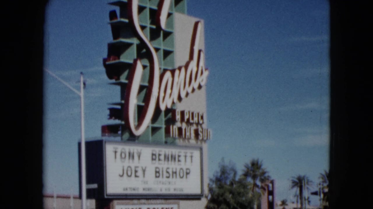 Dunes Hotel sign and marquee partly framed by 8mm film borders.