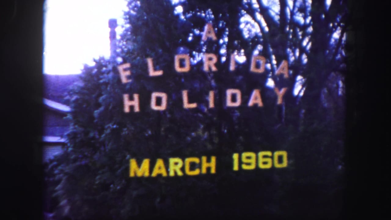 Tampa, Florida 1960 vacation title card showing A Florida Holiday above a yellow March 1960 date.