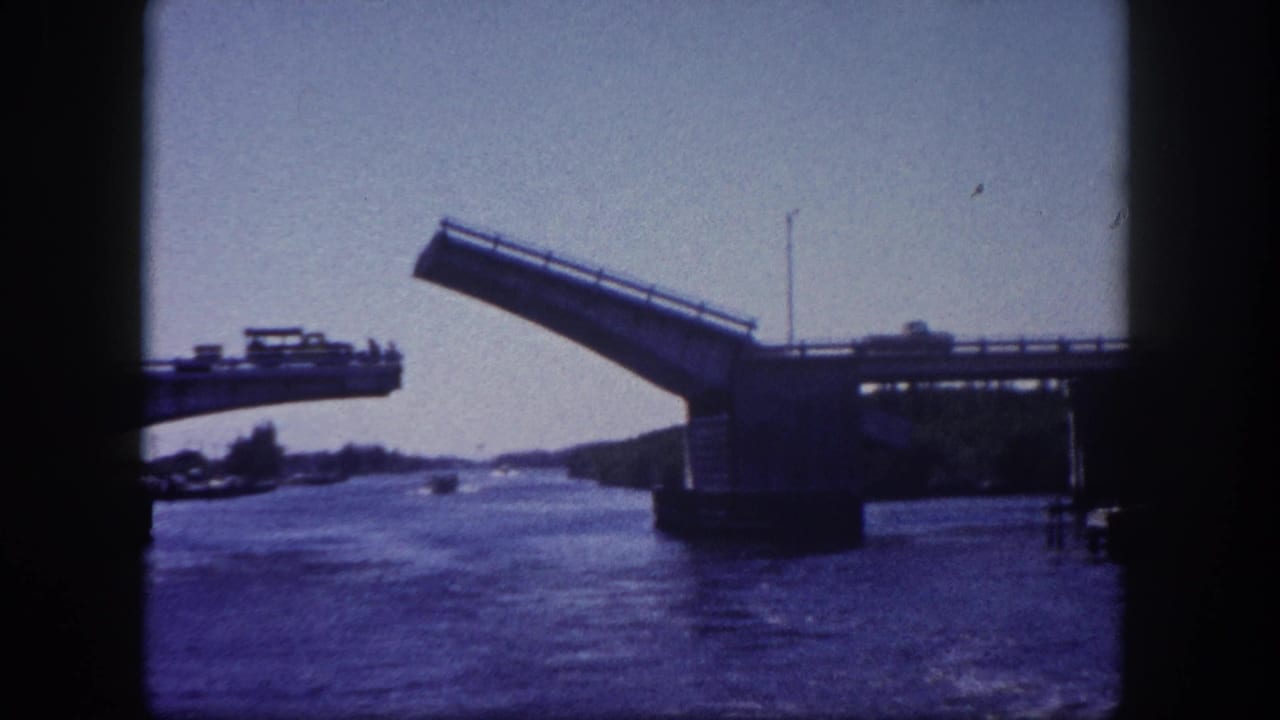 Raised bascule drawbridge over a Florida waterway, 8mm film circa 1960.