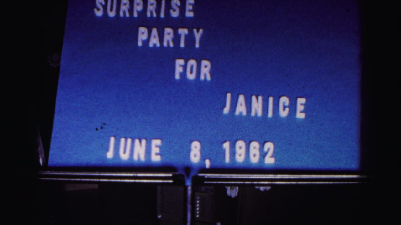 Blue title card with white letters reading surprise party for Janice, June 8, 1962.