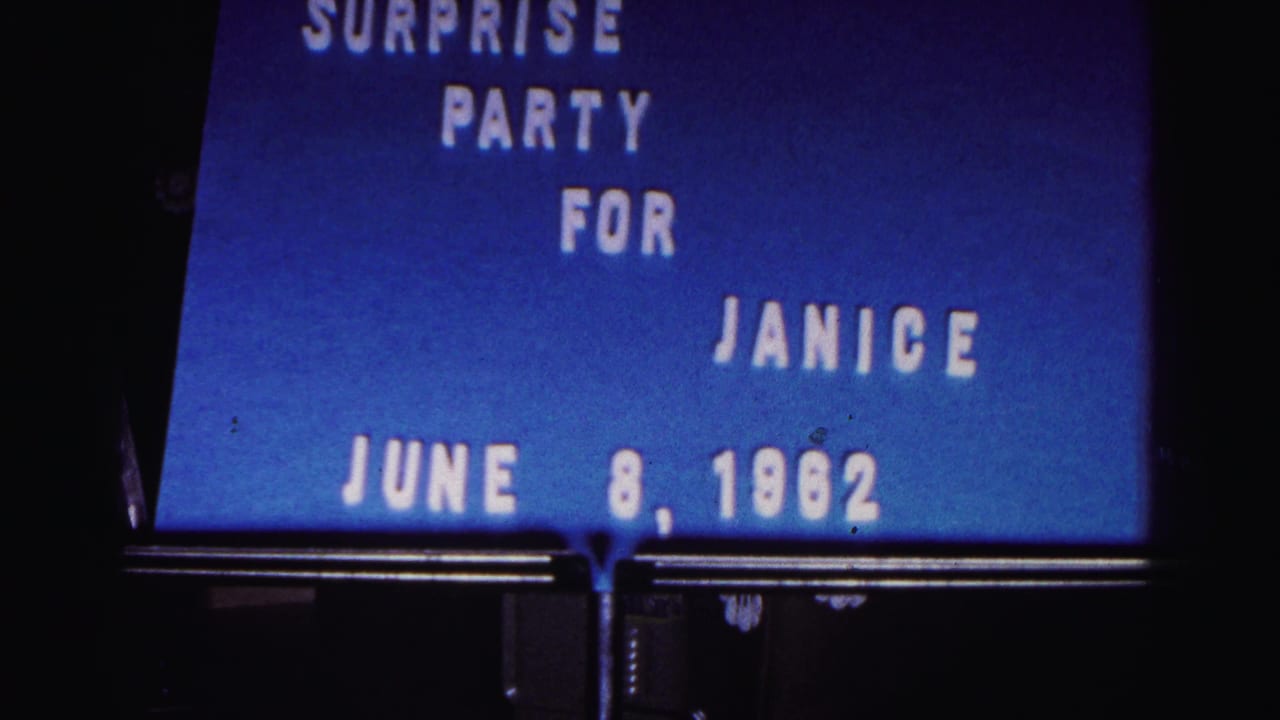 8mm frame of the blue title card reading surprise party for Janice, with the June 8, 1962 date visible near the bottom.