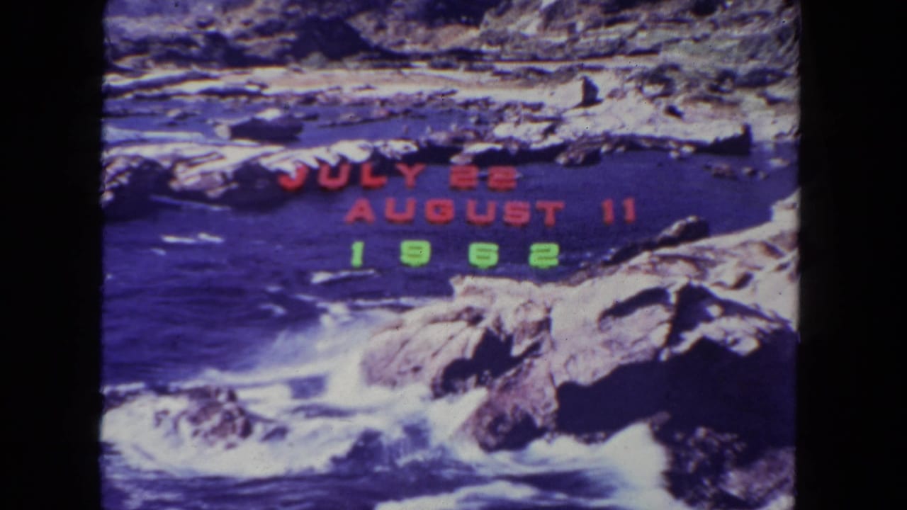 Rocky coastline and surf with the same colored date text overlay.