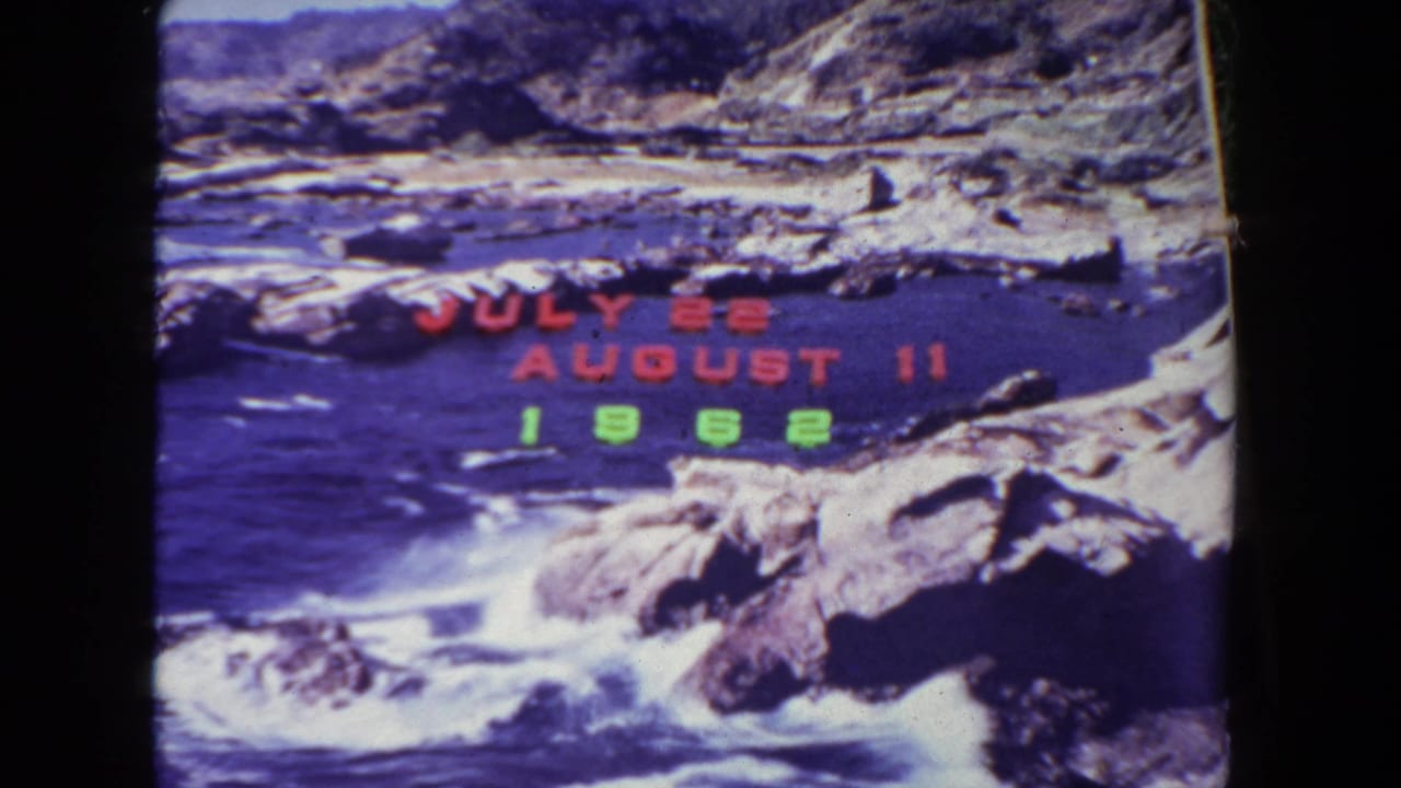 1962 San Diego vacation title slide over a rocky coastline, with red July and August dates and green year numerals.