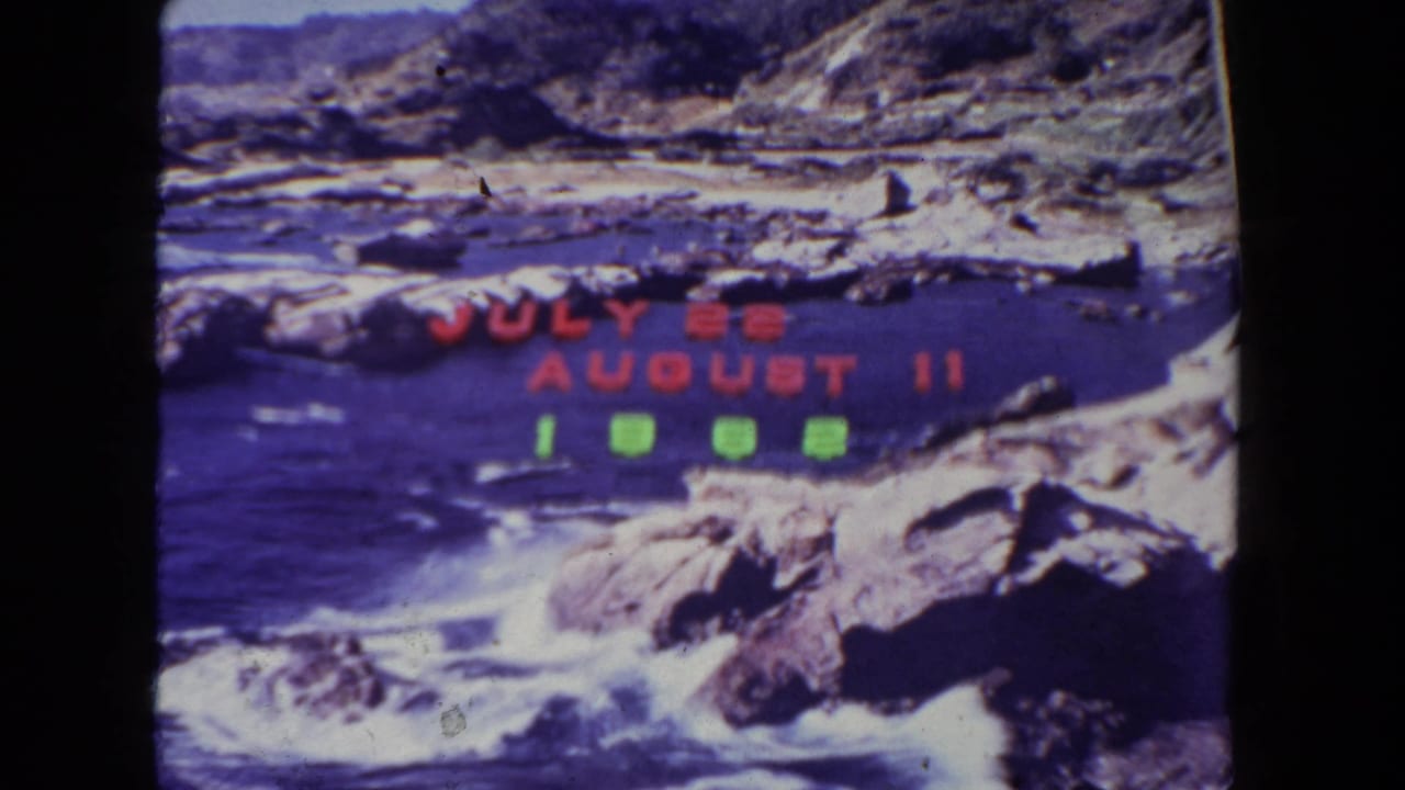 San Diego vacation title card from 1962, showing surf, rocks, red date text, and green year numerals within dark film edges.