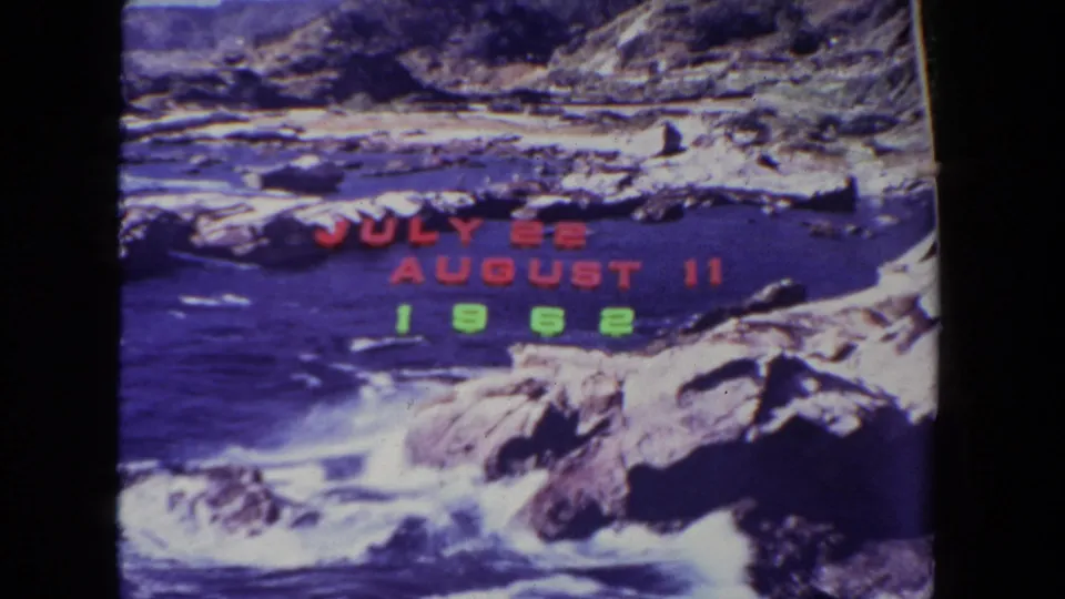 San Diego 1962 vacation title slide with red trip dates and green year text over a blue rocky coastline.