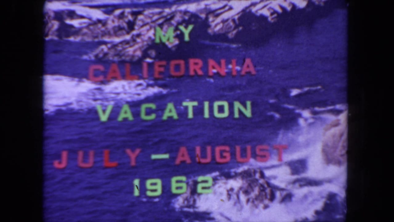 California vacation title card from 1962, framed by black film edges with ocean waves and rocky cliffs behind the text.