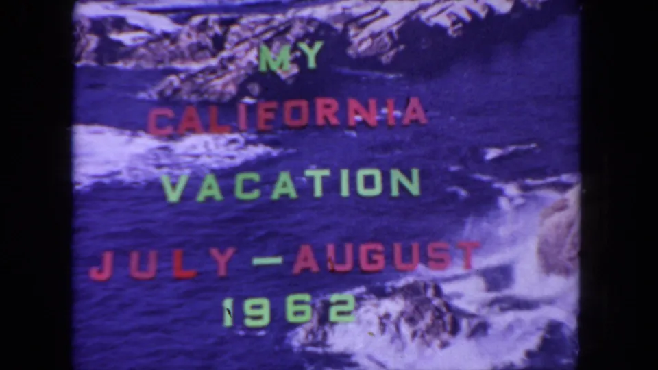 California vacation title card from 1962, framed by black film edges with ocean waves and rocky cliffs behind the text.