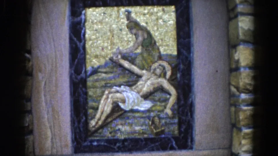 Sustained close-up of the outdoor lamentation mosaic; mourning and haloed reclining figures on gold tesserae, composition very similar to previous frame, Illinois c.1962.
