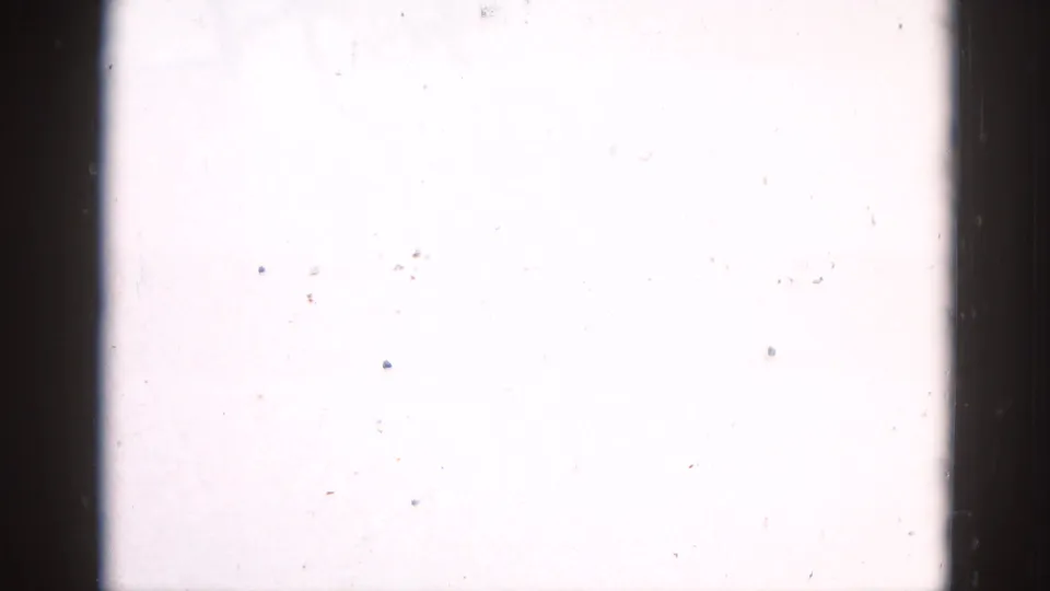 Heavily overexposed opening frame from a 1962 Illinois 8mm home movie, film burns to white with visible dust and grain.