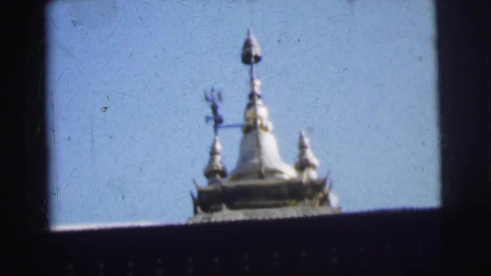 Close-up of a white ornate architectural spire with trident-style finial, consistent with a religious or heritage building in Calcutta, India, 1962.