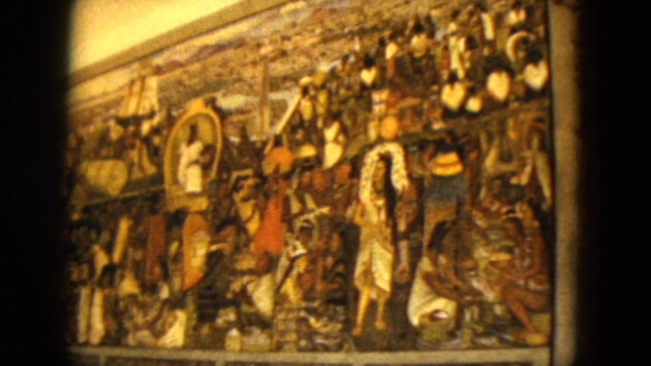 The 1962 Acapulco footage holds on a detailed religious painting, with small figures, robes, and warm 8mm color visible across the frame.