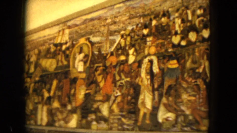 A slightly shifted 1962 Acapulco 8mm frame shows the framed religious painting with figures, decorative detail, and visible film softness.