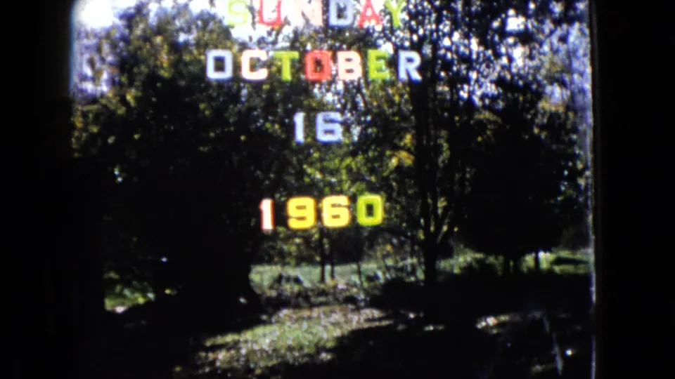 1960 Wauconda home-movie title frame showing Sunday October 16 1960 over trees and dappled grass.