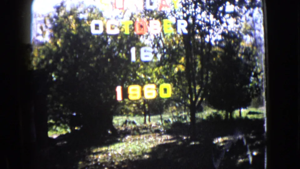 Final sampled frame shows the October 16 1960 title over a leafy Wauconda outdoor view with bright grass and shadowed trees.