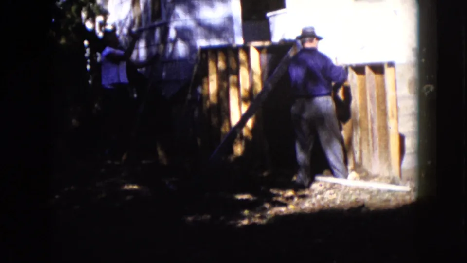 The final frame shows a 1960 Wauconda residential work scene, with a man in a hat beside boards and steps.