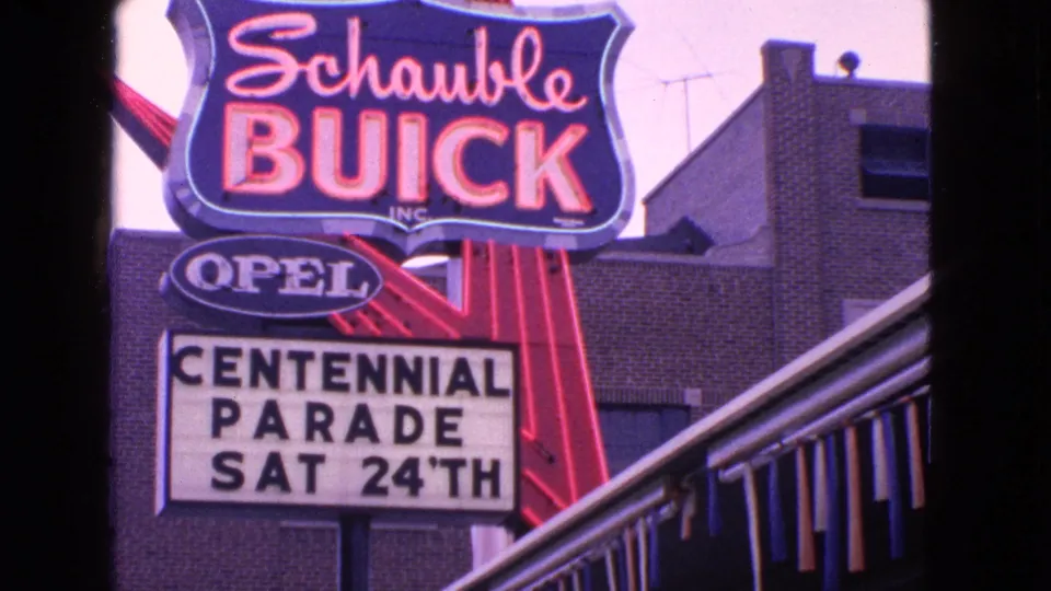 Final frame keeps the Barrington dealership signage centered, with the Centennial Parade Sat 24th marquee clearly legible below.