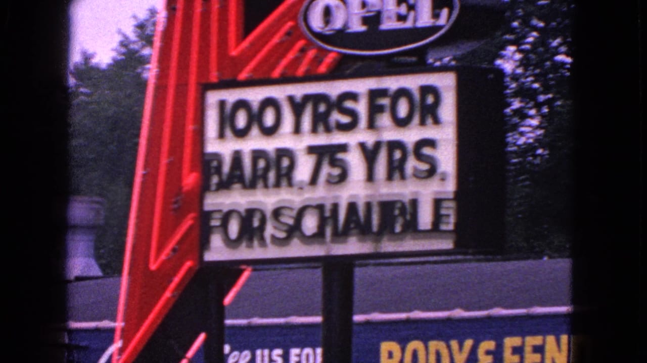 Closer view of the Opel logo and marquee with anniversary wording.