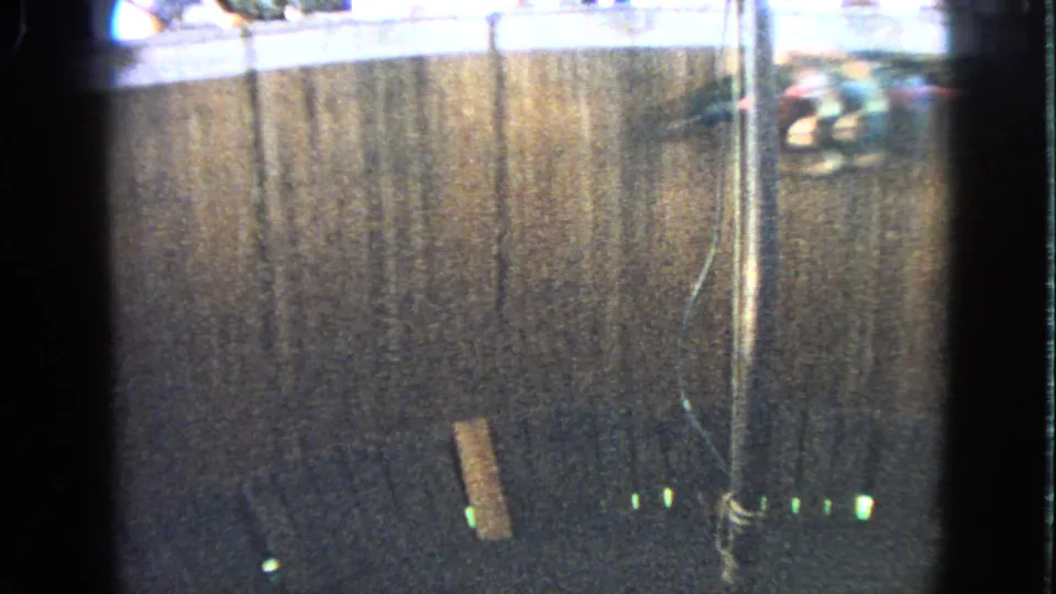 1963 Walworth 8mm frame with the motorcycle rider high on the circular wall, partially cropped near the upper right.