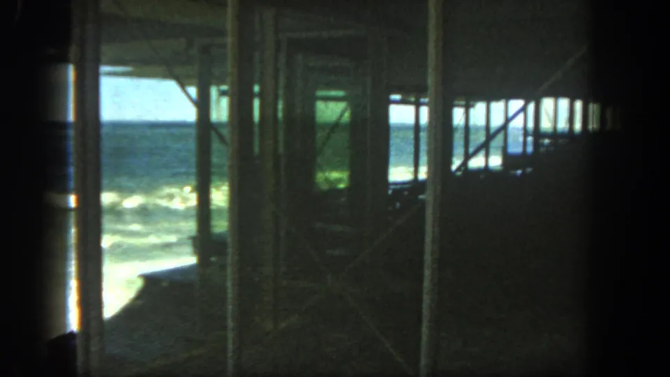 The final frame shows a darker interior view of a San Diego shoreline structure, with green-blue surf visible through repeated supports.