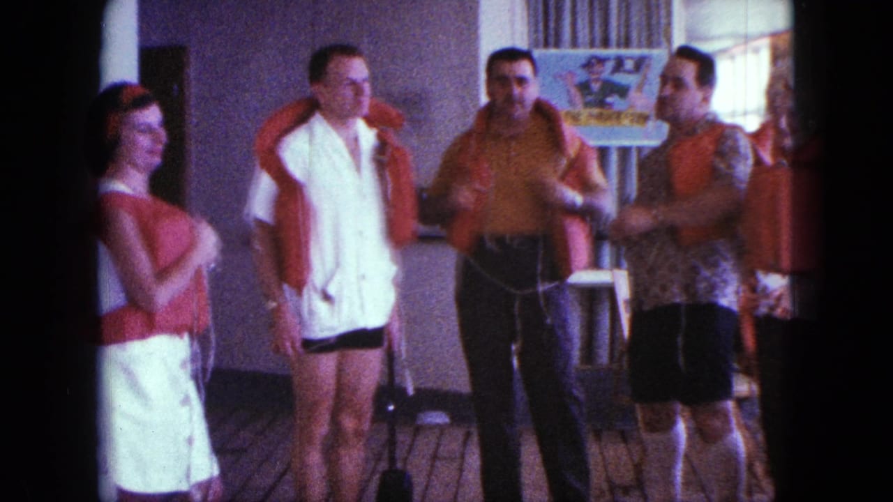 Adults in 1960s summer attire stand on a boat deck in San Diego while orange flotation vests are shown and worn.
