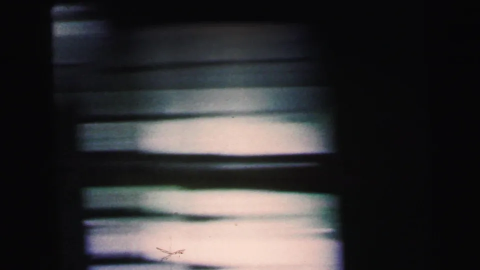 Motion-blurred light filtering through horizontal venetian blinds, 8mm home movie, Camden, New Jersey, circa 1964