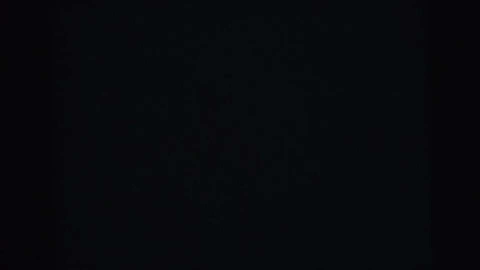 Black frame from the start of a 1964 8mm home-movie reel; no visual content is present in this frame.