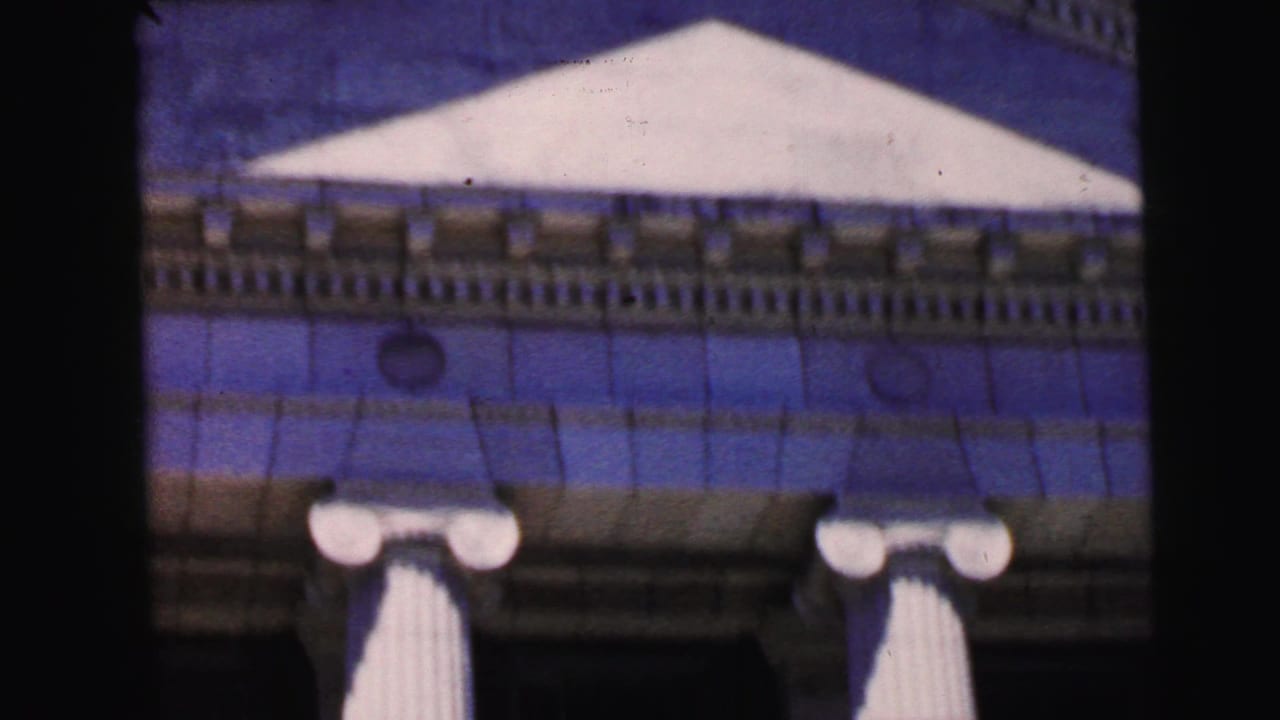 Neoclassical courthouse pediment and colonnade with globe lamp fixtures, Camden, New Jersey, 1964, showing characteristic 8mm color shift