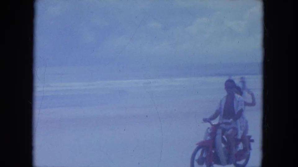 At the end of the 1964 Clearwater beach clip, the riders pass close to camera with the passenger still gesturing near the surf.