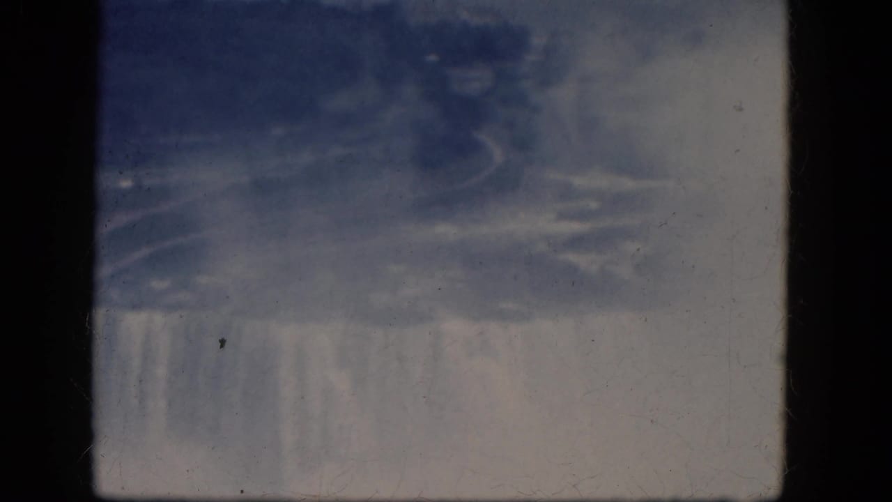 Soft 8mm view of mist and water near the brink of Horseshoe Falls.