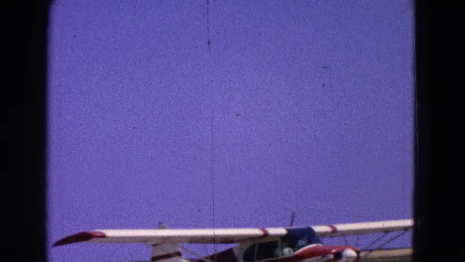 The final frame shows mostly purple sky with partial aircraft wings entering along the lower edge.