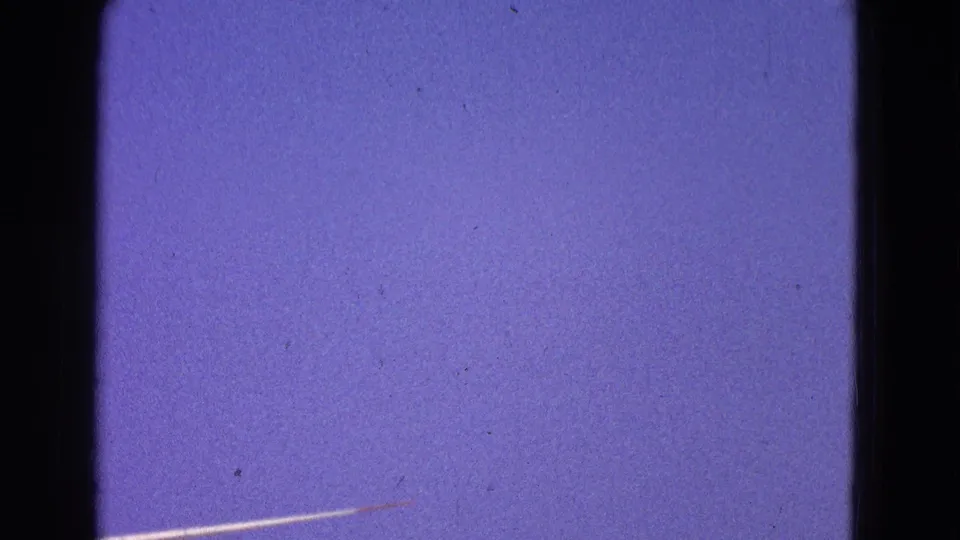 Final frame from the 1964 Washington, DC clip shows mostly saturated sky with a small portion of the aircraft still visible near the bottom.