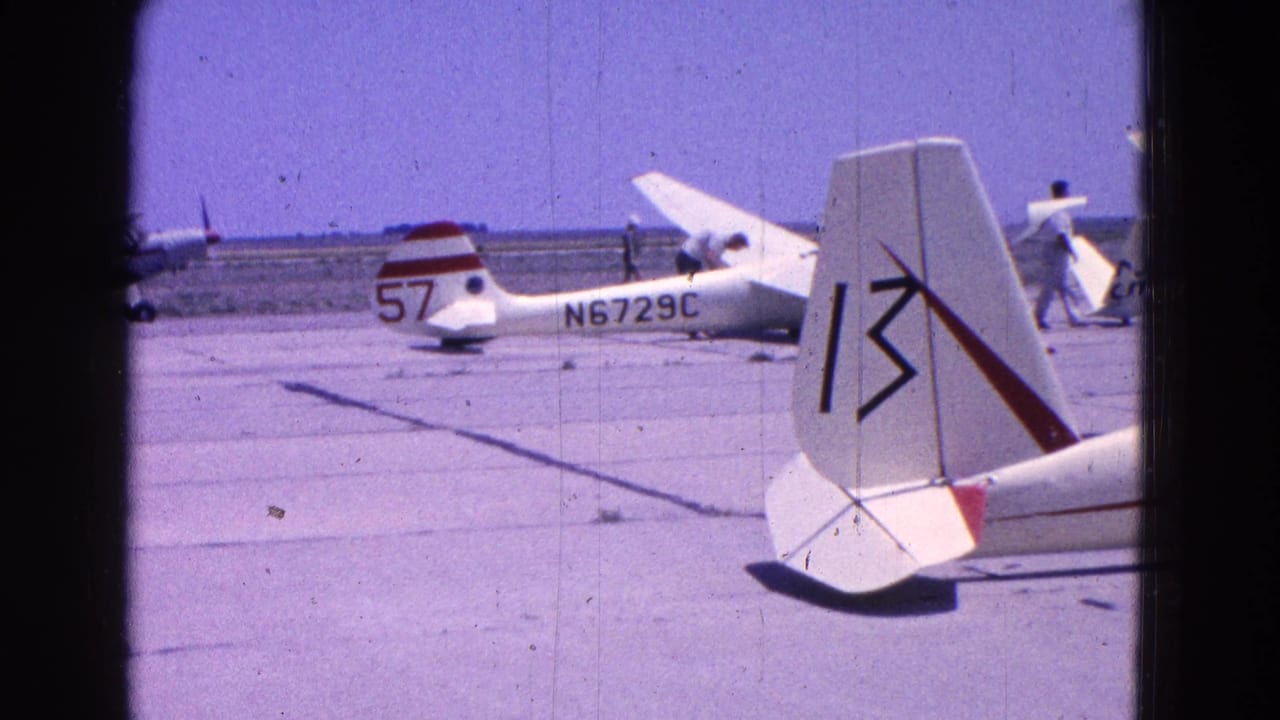 Light aircraft on a tarmac with registration N6729C and a cropped foreground tail section.